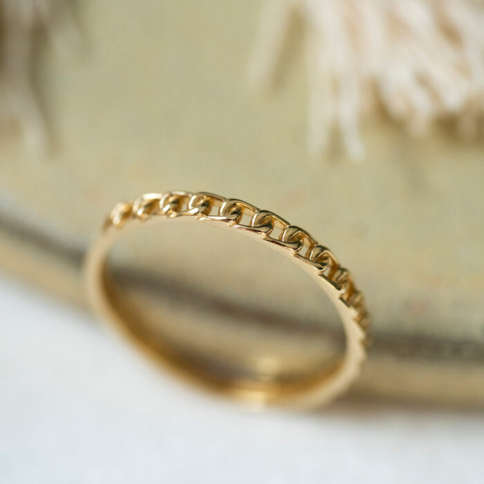 2296087 2 NC Christophersen - Ring i gult gull med "panserlenke" mønster NC Christophersen - Ring i gult gull med "panserlenke" mønster
