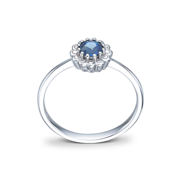 Diamonds by Frisenberg - Liten rosett ring i hvitt gull med diamanter og en safir